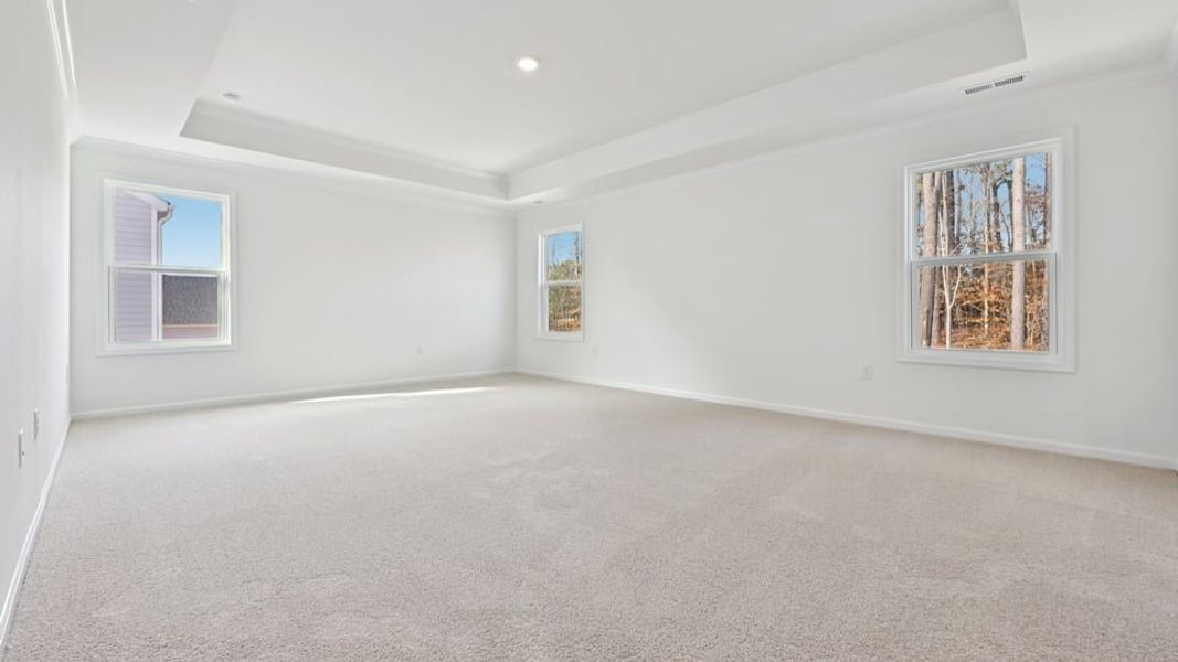 Representative unfurnished interior of a home built from the Wylie by D.R. Horton in Eagle Creek, Fuquay Varina (Image 30).