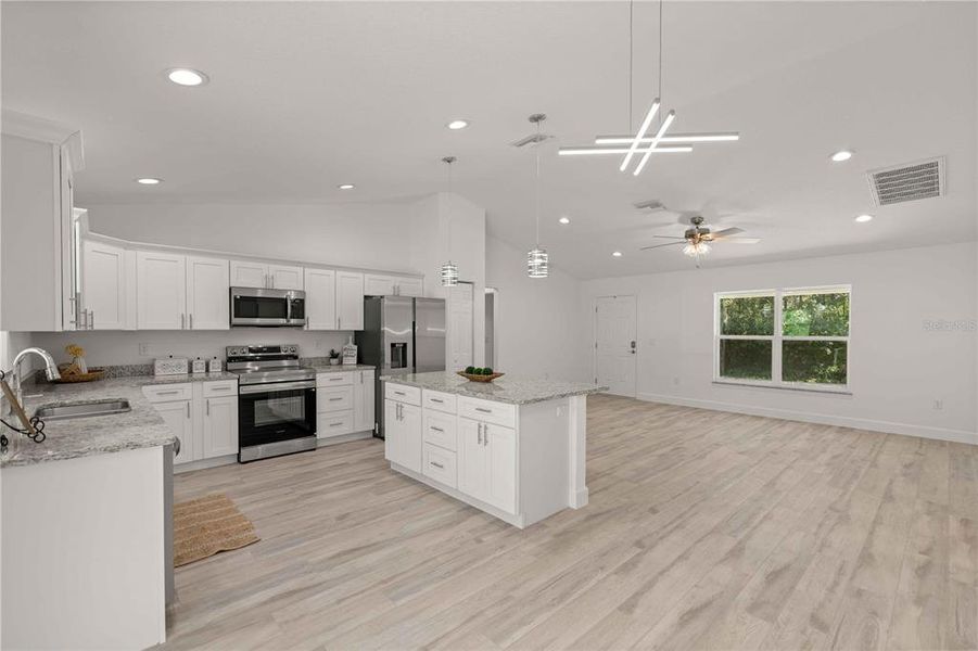 Furnished interior view inside a new home in , Dunnellon (Image 7).