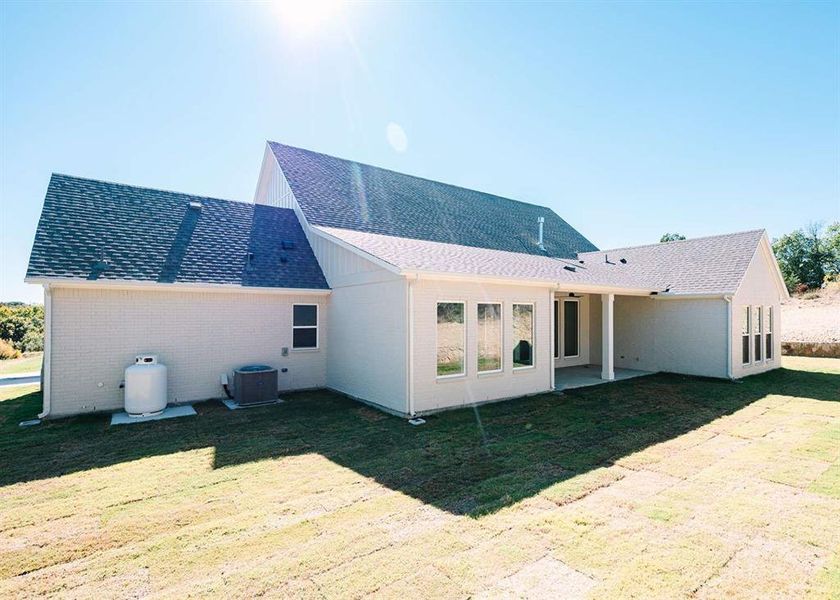Exterior details and patio area of a home in , Weatherford (Image 3).