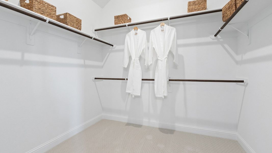 Representative furnished interior of a home built from the Oleander by Brightland Homes in Sunterra, Katy (Image 13).