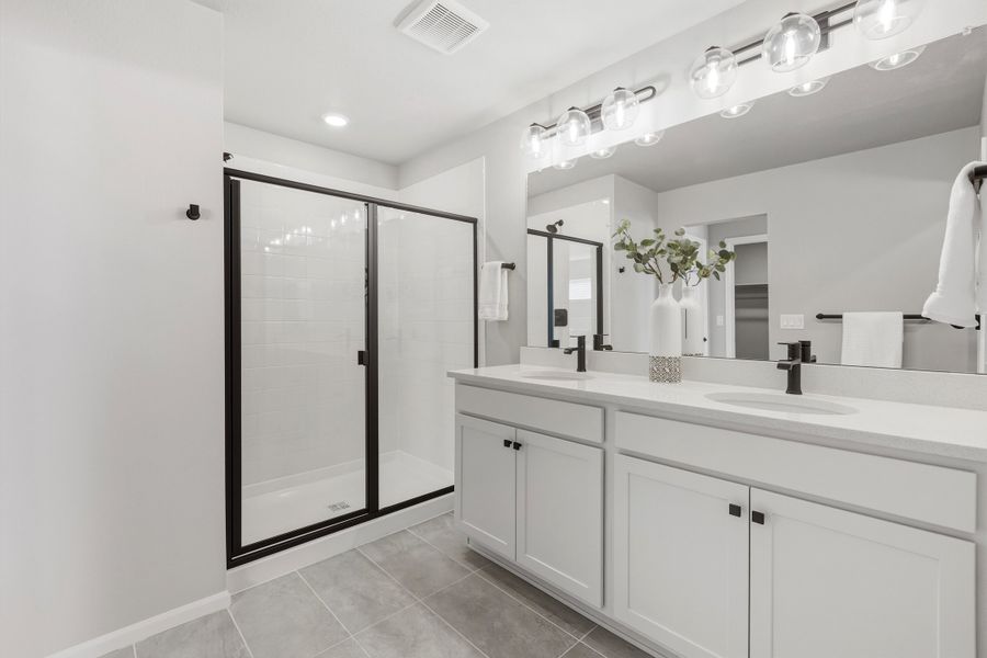 Furnished interior view inside a new home in Woodrose at Painted Prairie, Aurora (Image 14).