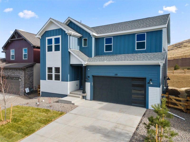 Front exterior of a new home in The Manors Collection at Golden Overlook, Golden, CO, highlighting curb appeal (Image 26).