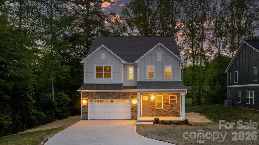 Front exterior of a new home in , Hickory, NC, highlighting curb appeal (Image 26).