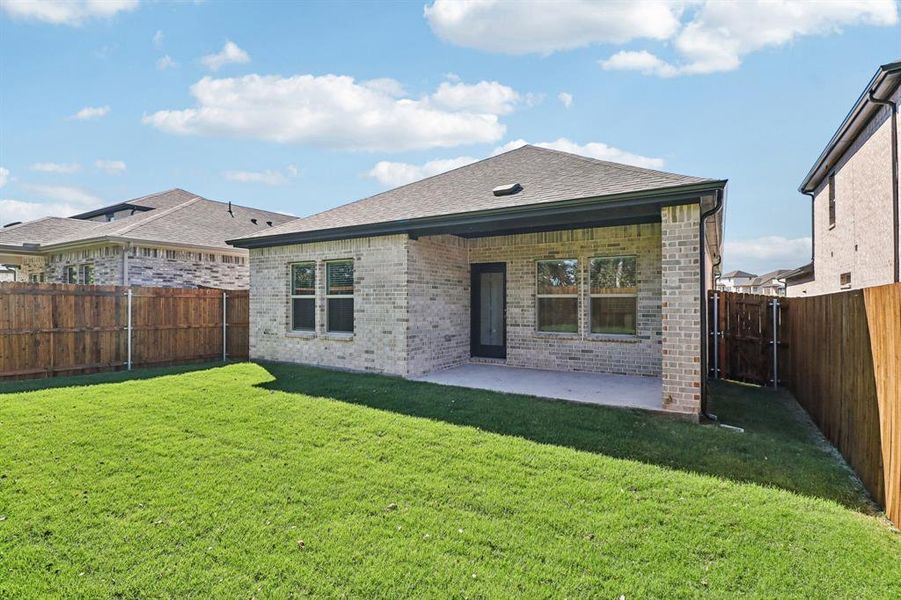 Exterior details and patio area of a home in Eastridge - Spring Series, McKinney (Image 20). Exterior details and patio area of a home in Eastridge - Spring Series, McKinney (Image 20).