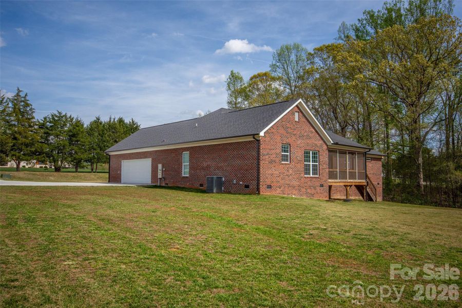 Exterior details and patio area of a home in , Statesville (Image 24).