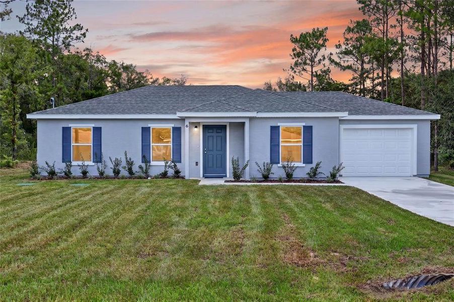 Front exterior of a new home in , Ocala, FL, highlighting curb appeal (Image 19).