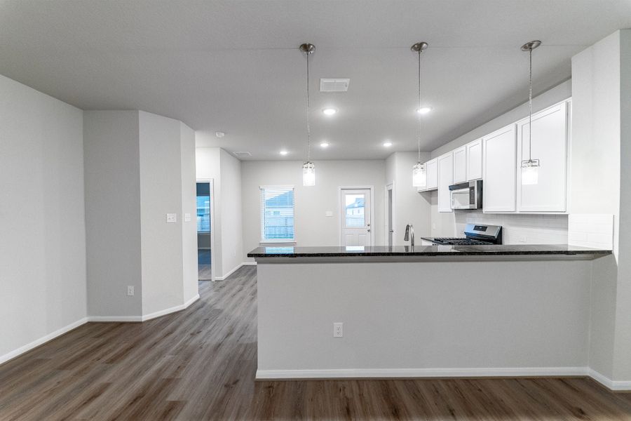 Furnished interior view inside a new home in Hennersby Hollow, San Antonio (Image 4).