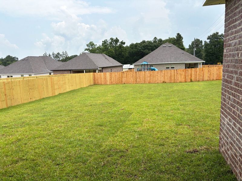 Exterior details and patio area of a home in Young Oaks, Crestview (Image 19).