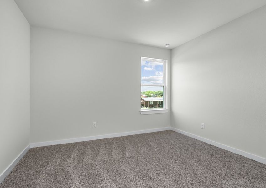 Large secondary bedroom with carpet. Large secondary bedroom with carpet.
