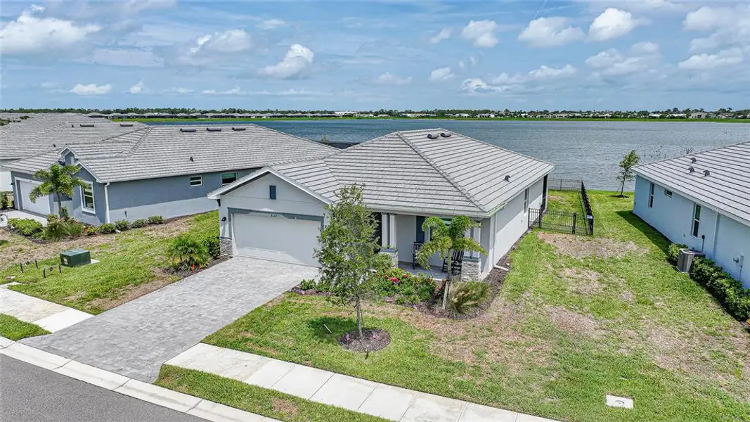 Front exterior of a new home in , Englewood, FL, highlighting curb appeal (Image 2). Front exterior of a new home in , Englewood, FL, highlighting curb appeal (Image 2).