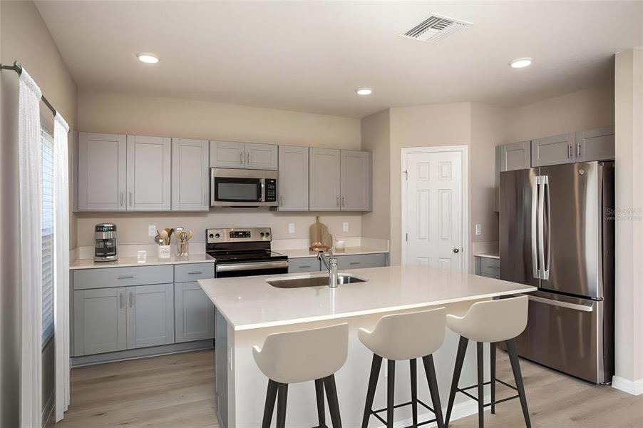 Furnished interior view inside a new home in Scenic Terrace, Haines City (Image 2).