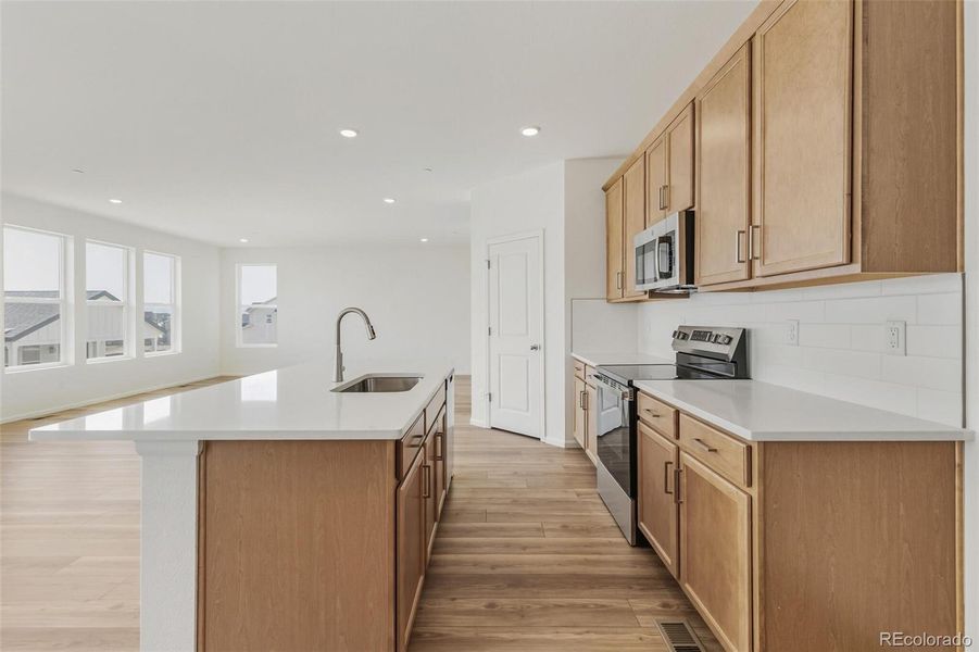 Furnished interior view inside a new home in Turnberry, Commerce City (Image 12).