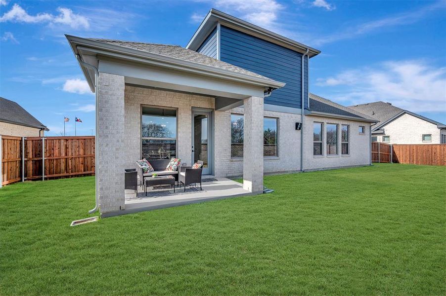 Exterior details and patio area of a home in South Pointe Manor Series, Mansfield (Image 3).
