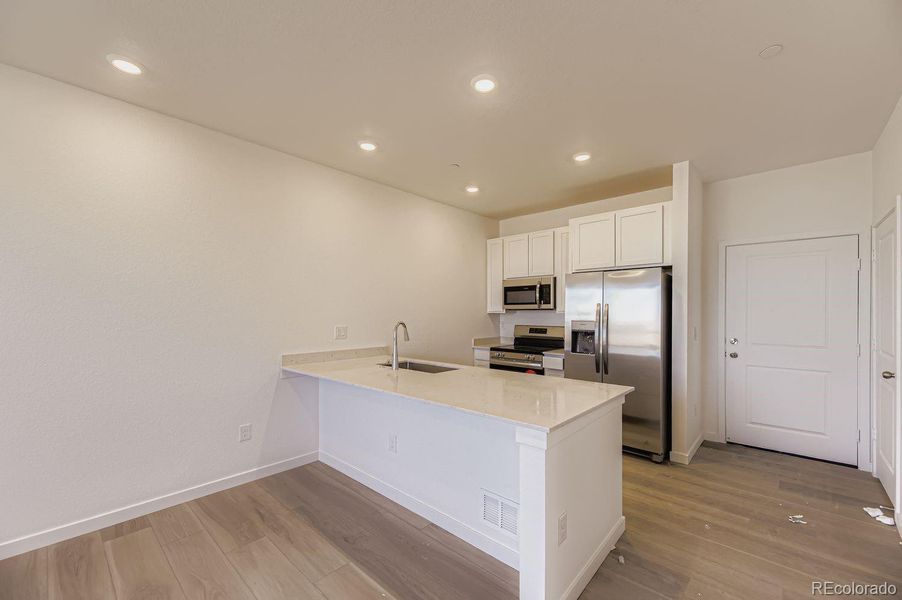Furnished interior view inside a new home in , Centennial (Image 7).