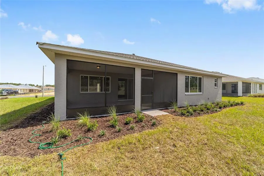 Exterior details and patio area of a home in , Ocala (Image 26).