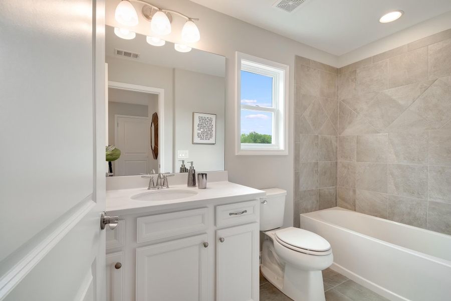 Representative furnished interior of a home built from the The Everleigh by Windsong Properties in Madeira, Acworth (Image 10).