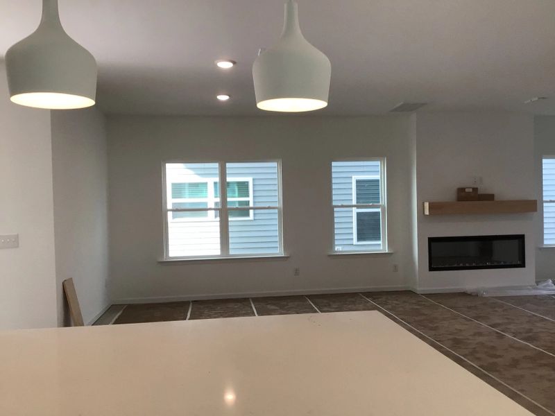 Family Room featuring the AW Collection® Coastal - Open and airy with soft-toned finishes.