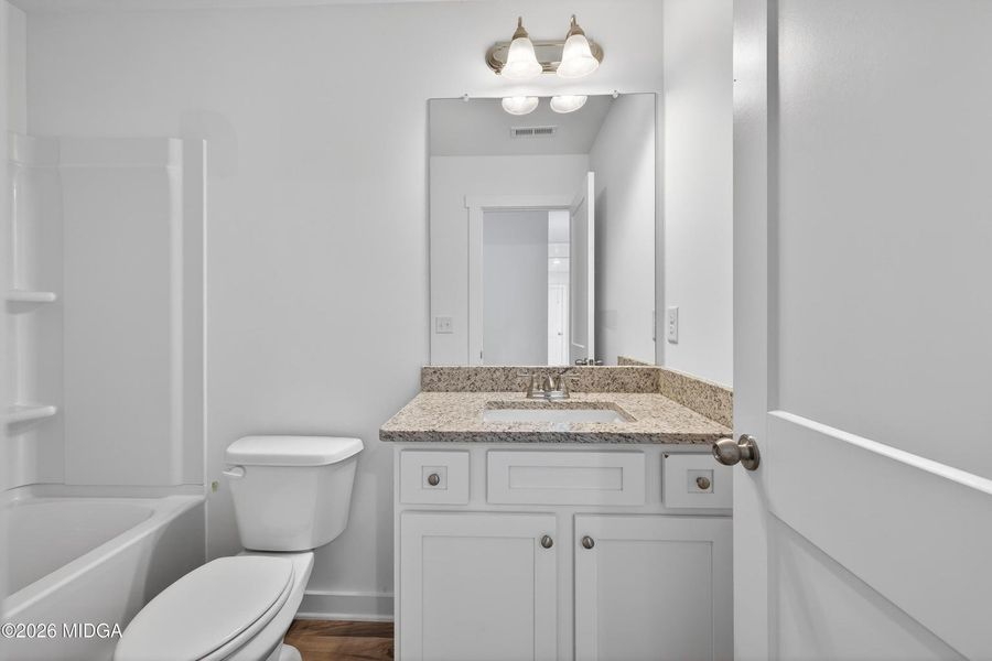 Furnished interior view inside a new home in Robins Estates, Warner Robins (Image 14).
