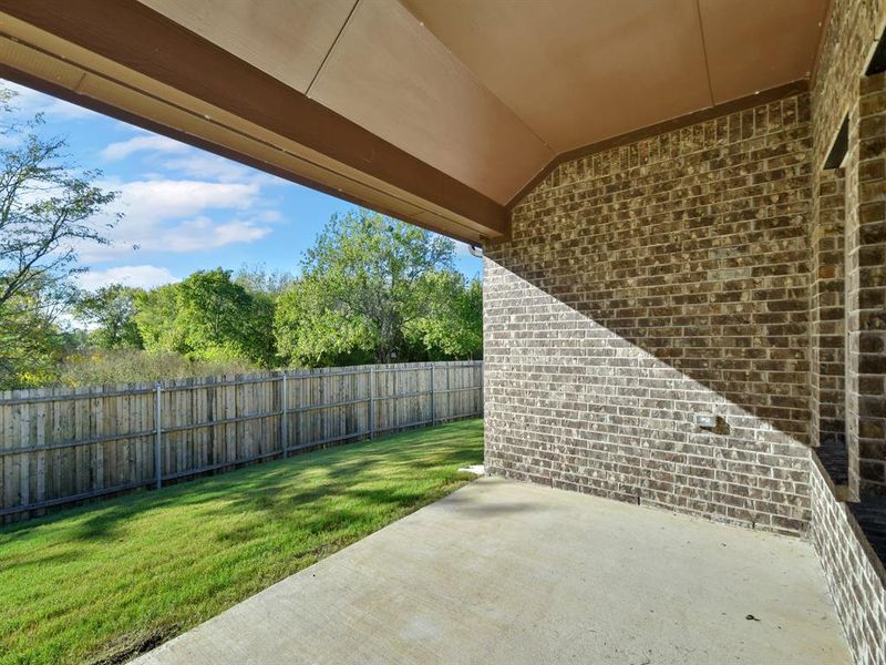 Exterior details and patio area of a home in Pecan Creek Crossing, Valley View (Image 16). Exterior details and patio area of a home in Pecan Creek Crossing, Valley View (Image 16).