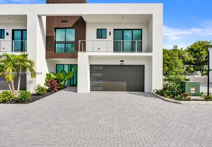Front exterior of a new home in , Dania Beach, FL, highlighting curb appeal (Image 27).