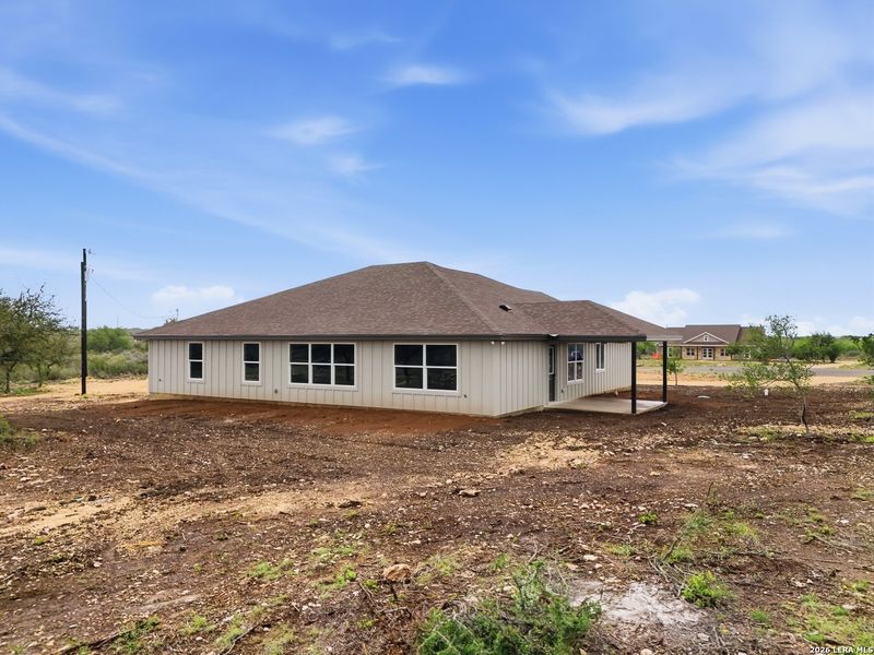 Exterior details and patio area of a home in , Uvalde (Image 19).