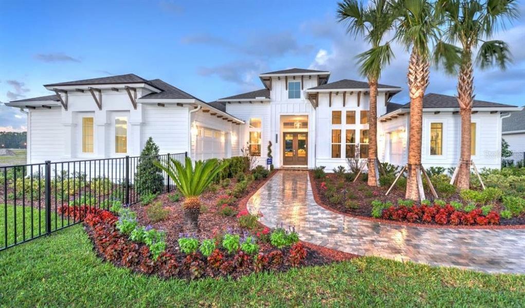 Front exterior of a new home in Oakmont, Gainesville, FL, highlighting curb appeal (Image 1). Front exterior of a new home in Oakmont, Gainesville, FL, highlighting curb appeal (Image 1).