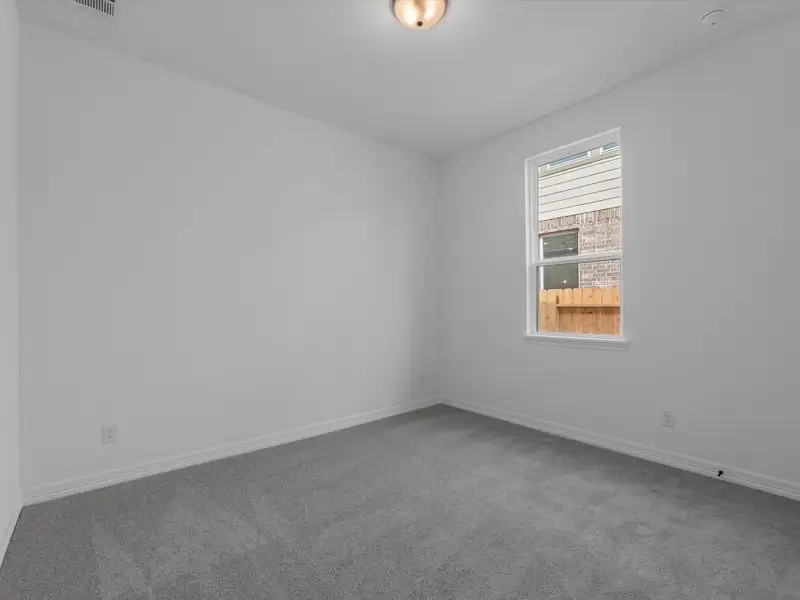 Secondary bedroom. Sample product photo. Actual exterior and interior selections may vary by homesite. Photo may be virtually staged.
