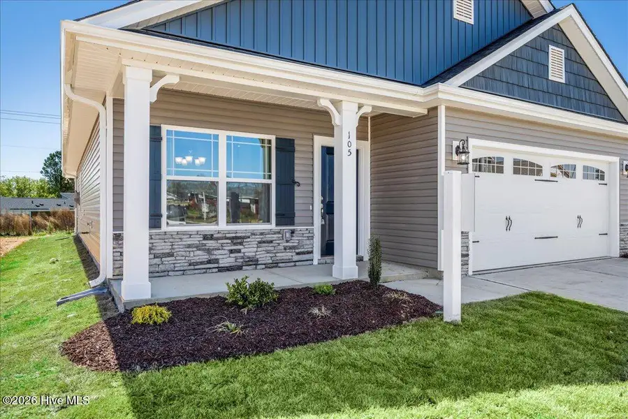 Exterior details and patio area of a home in Patriots Pointe, Jacksonville (Image 2). Exterior details and patio area of a home in Patriots Pointe, Jacksonville (Image 2).