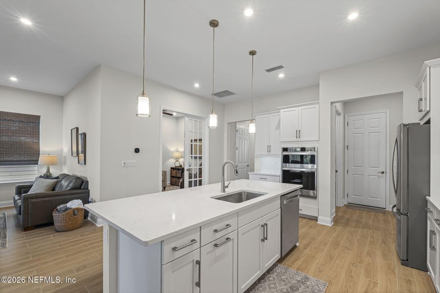 Furnished interior view inside a new home in RiverTown - WaterSong, St. Johns (Image 8).