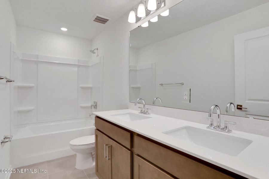 Furnished interior view inside a new home in Silver Landing at SilverLeaf, St. Augustine (Image 12). Furnished interior view inside a new home in Silver Landing at SilverLeaf, St. Augustine (Image 12).