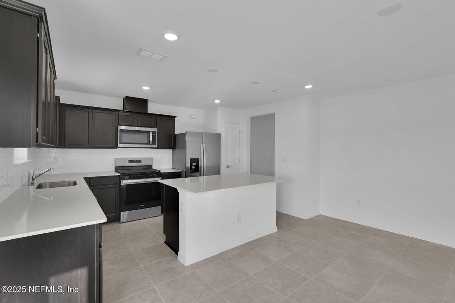 Furnished interior view inside a new home in Wells Landing, Jacksonville (Image 3).