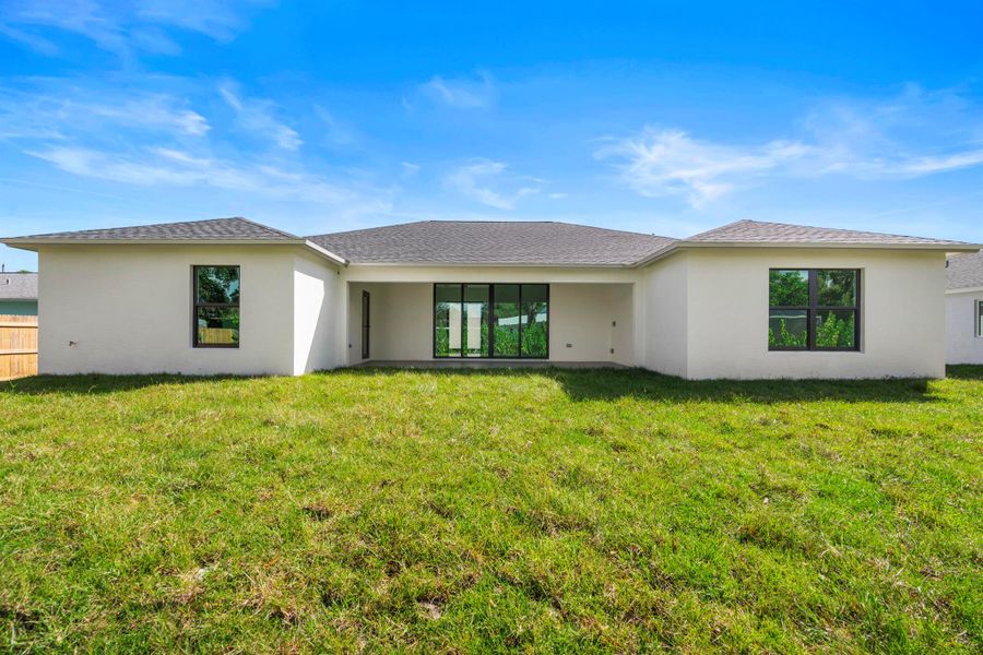 Front exterior of a new home in , Fort Pierce, FL, highlighting curb appeal (Image 29). Front exterior of a new home in , Fort Pierce, FL, highlighting curb appeal (Image 29).
