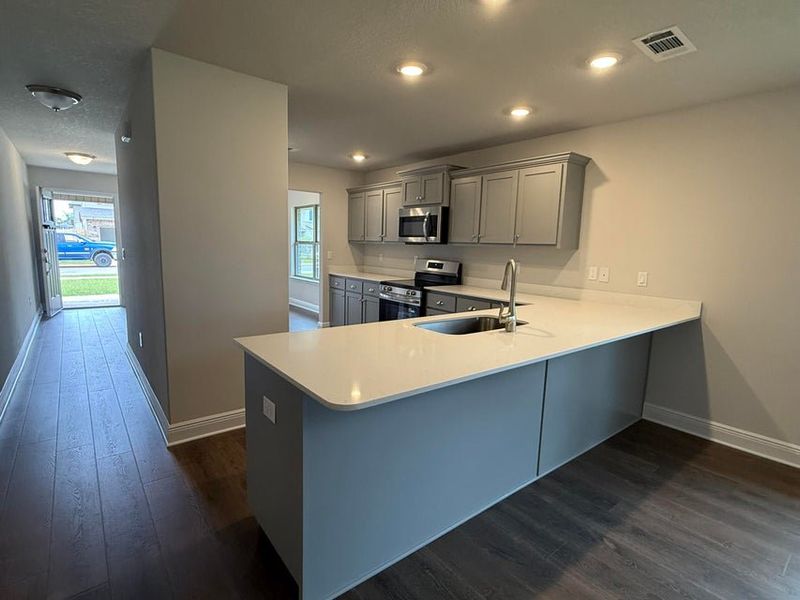 Furnished interior view inside a new home in Ridgeway Landing, Crestview (Image 5).