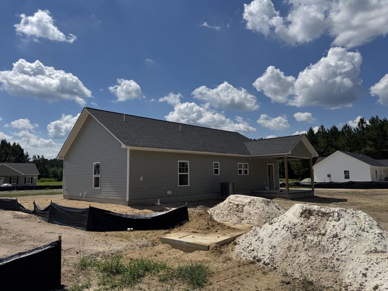 Front exterior of a new home in , St. George, SC, highlighting curb appeal (Image 14).