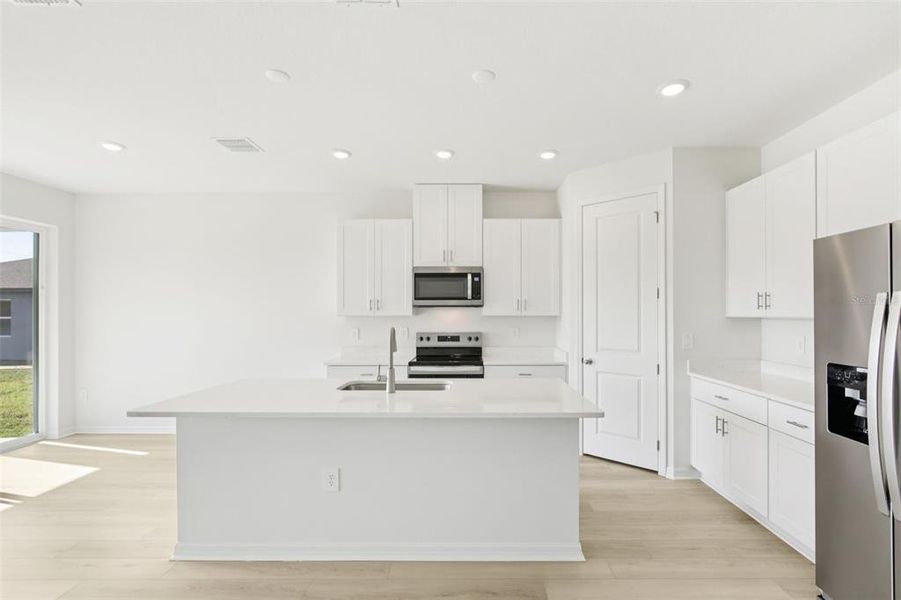 Furnished interior view inside a new home in Coasterra - Reserve Series, Palmetto (Image 12).