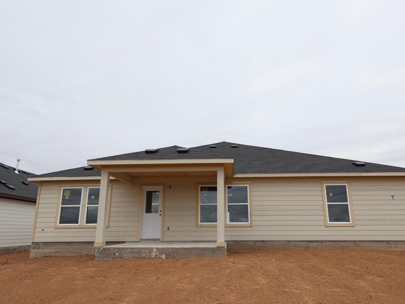 Exterior details and patio area of a home in Carillon, Manor (Image 3).