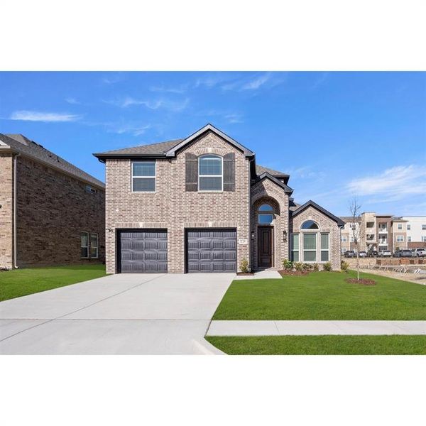 Front exterior of a new home in The Villages at Charleston, Glenn Heights, TX, highlighting curb appeal (Image 18).