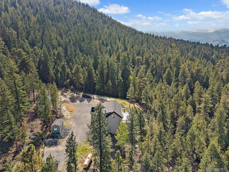 Storage shed included on property.