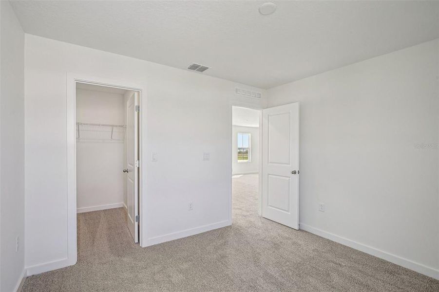 Spacious, unfurnished interior of a new home in Willowbrook North, Winter Haven (Image 28).