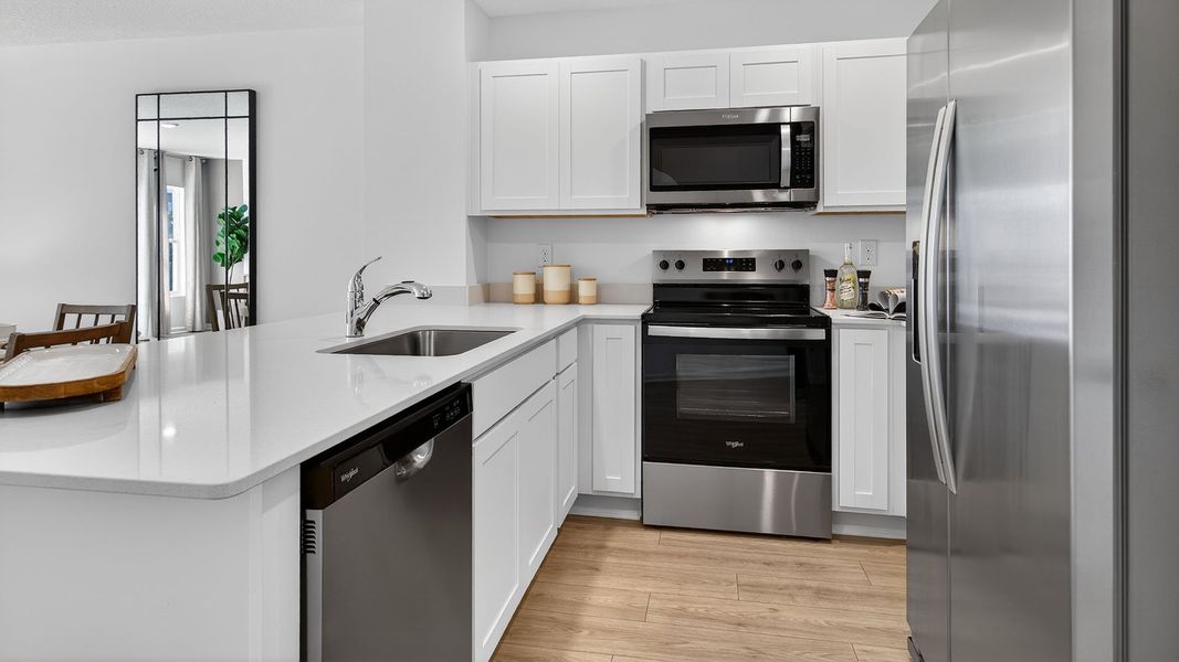 Representative furnished interior of a home built from the Sage by D.R. Horton in Corsair, Middleburg (Image 6).