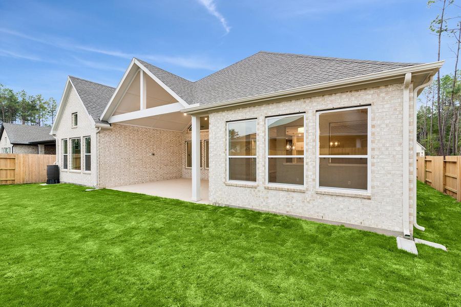 Exterior details and patio area of a home in ARTAVIA 65' Homesites, Conroe (Image 3).