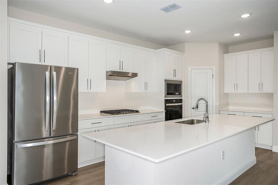 Furnished interior view inside a new home in Pasadena Woods, Dade City (Image 7).