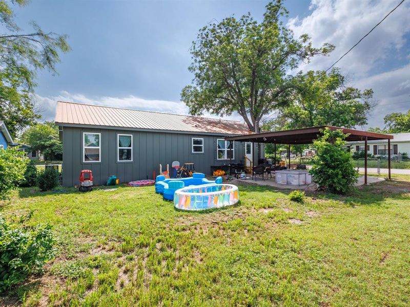 Exterior details and patio area of a home in , Brownwood (Image 25).