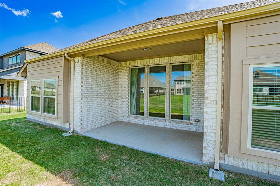 Front exterior of a new home in Abe's Landing, Granbury, TX, highlighting curb appeal (Image 24). Front exterior of a new home in Abe's Landing, Granbury, TX, highlighting curb appeal (Image 24).