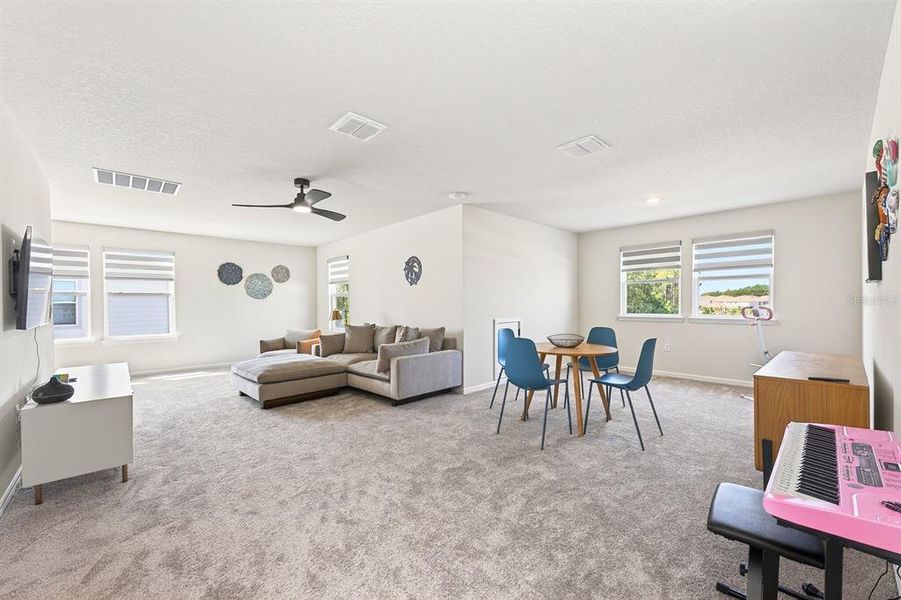 Furnished interior view inside a new home in , Winter Garden (Image 10).
