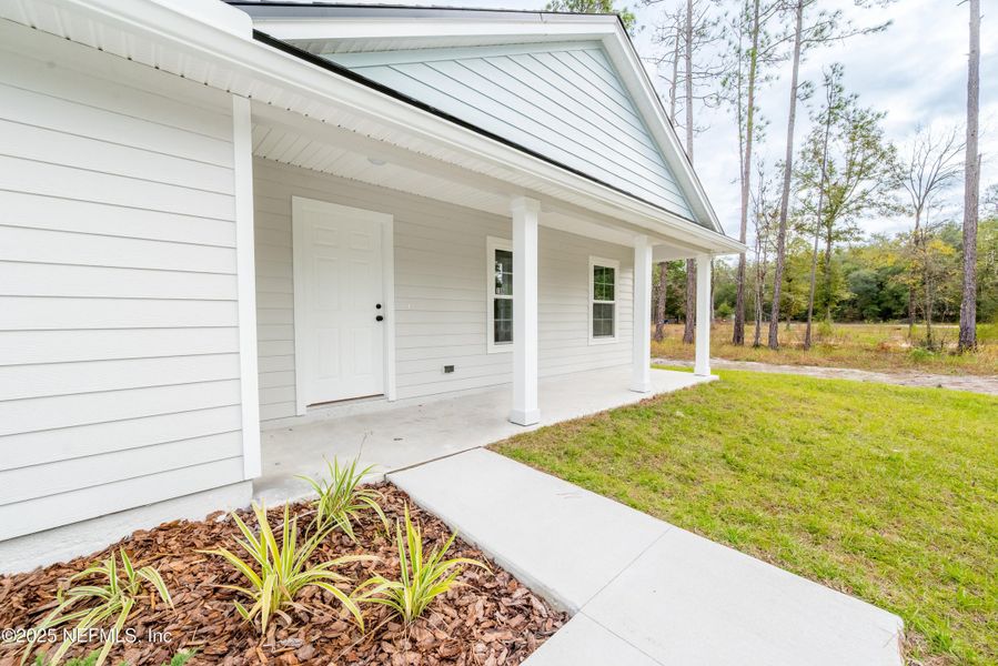 Exterior details and patio area of a home in , Florahome (Image 28).