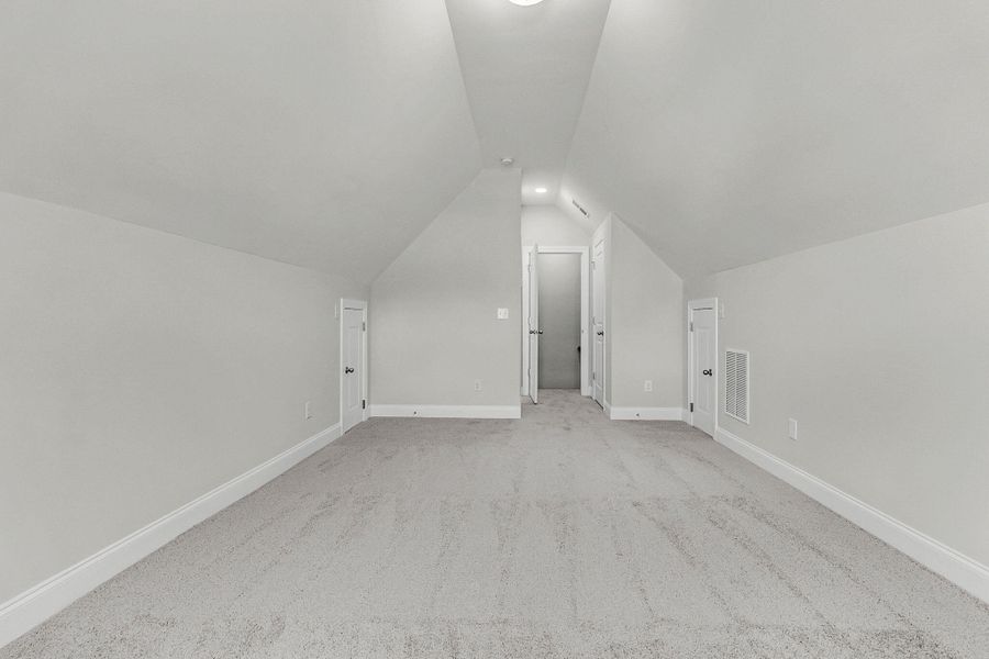 Spacious, unfurnished interior of a new home in Tidewater at Lakes of Cane Bay, Summerville (Image 23).