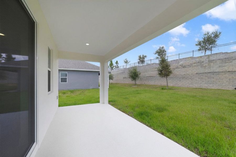 Exterior details and patio area of a home in Vintner Reserve, Clermont (Image 3).