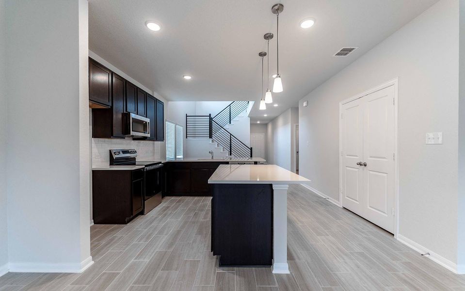 Furnished interior view inside a new home in Swenson Heights, Seguin (Image 3).