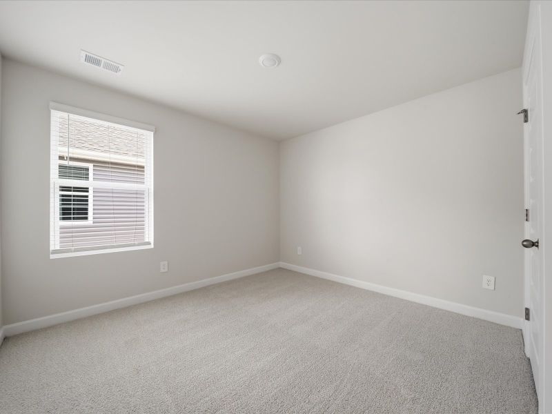 Spacious, unfurnished interior of a new home in The Farm at Wells Creek - Signature Collection, Gray Court (Image 16).